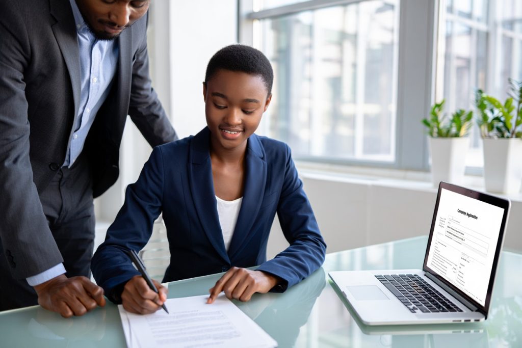 female entrepreneur signing